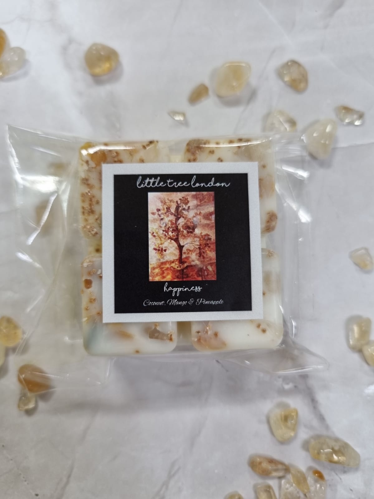 Happiness Luxury wax melts with Citrine crystal chips. Luxury wax melts with dried roses. High fragranced, long lasting.