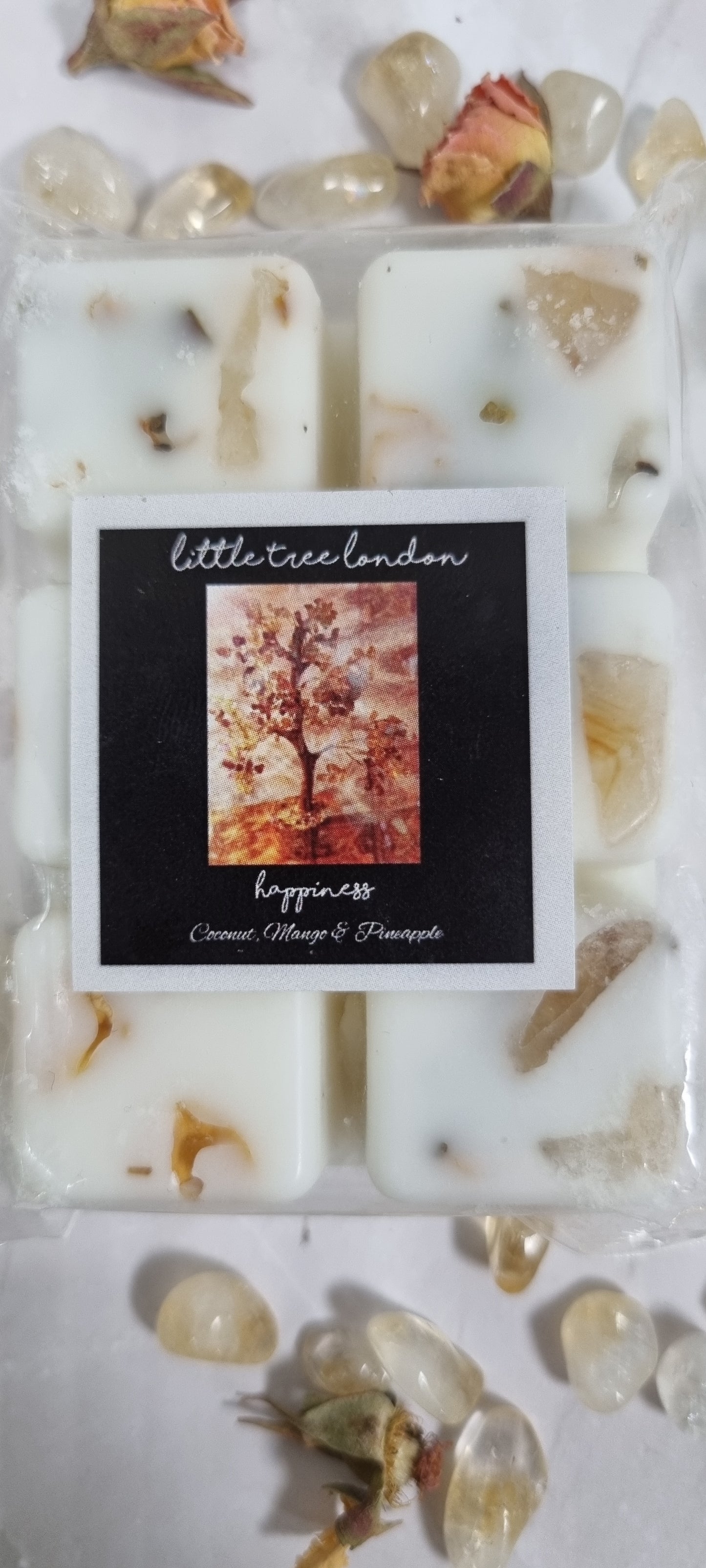 Happiness Luxury wax melts with Citrine crystal chips. Luxury wax melts with dried roses. High fragranced, long lasting.