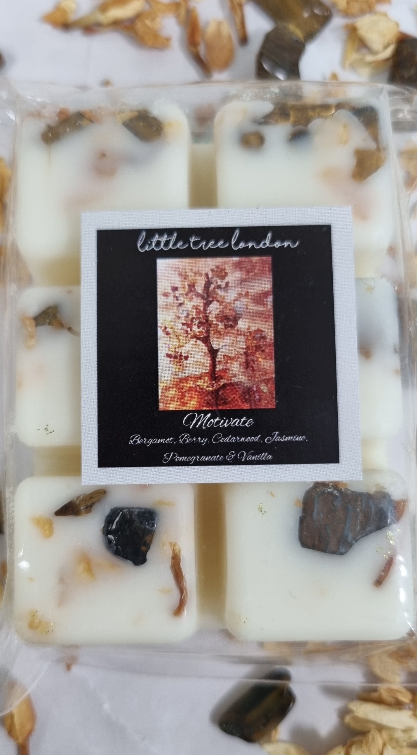 Motivate Luxury wax melts with tiger eye crystals chips. Unique wax melts dried Jasmine.  High fragranced, long lasting.